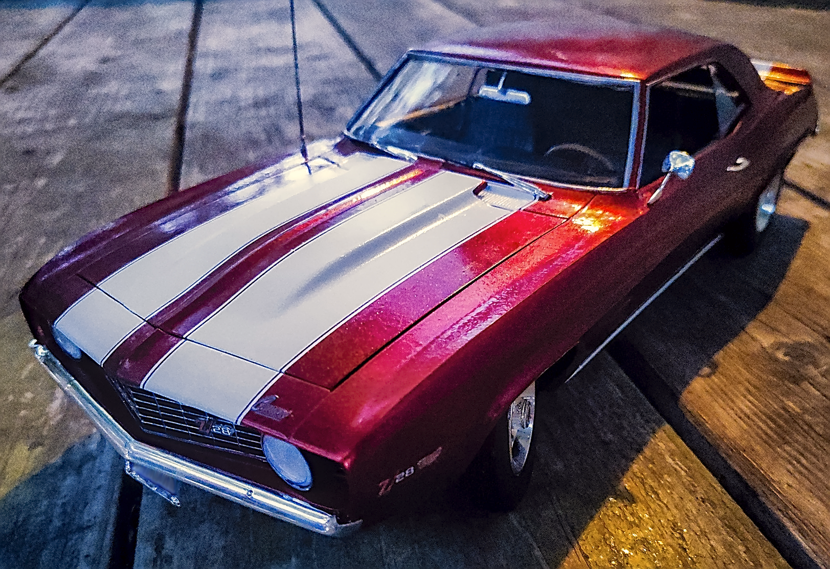 Beautiful red metallic paint flawed due to heavy coats and resulting orange peel ripples